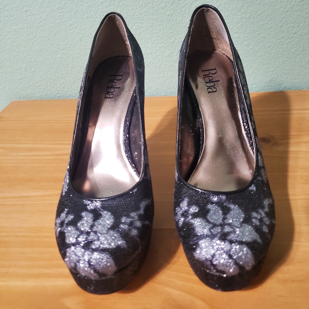 Black and silver platform heels